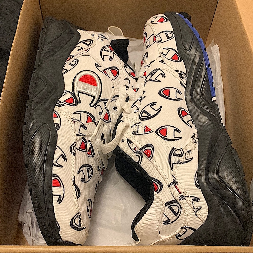 Red white and black champion shoes.